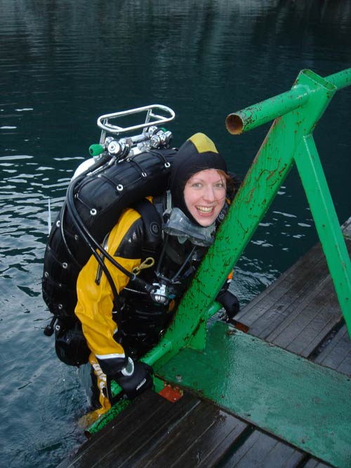 Cat gets in slowly...the water's freezin!