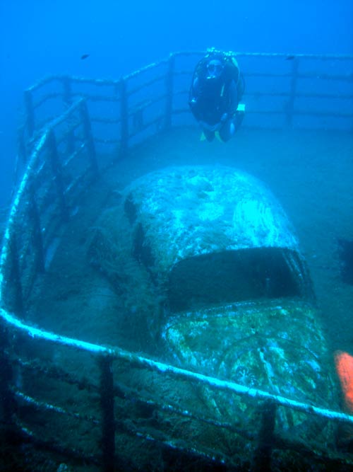 gucci yacht with VW bug on board